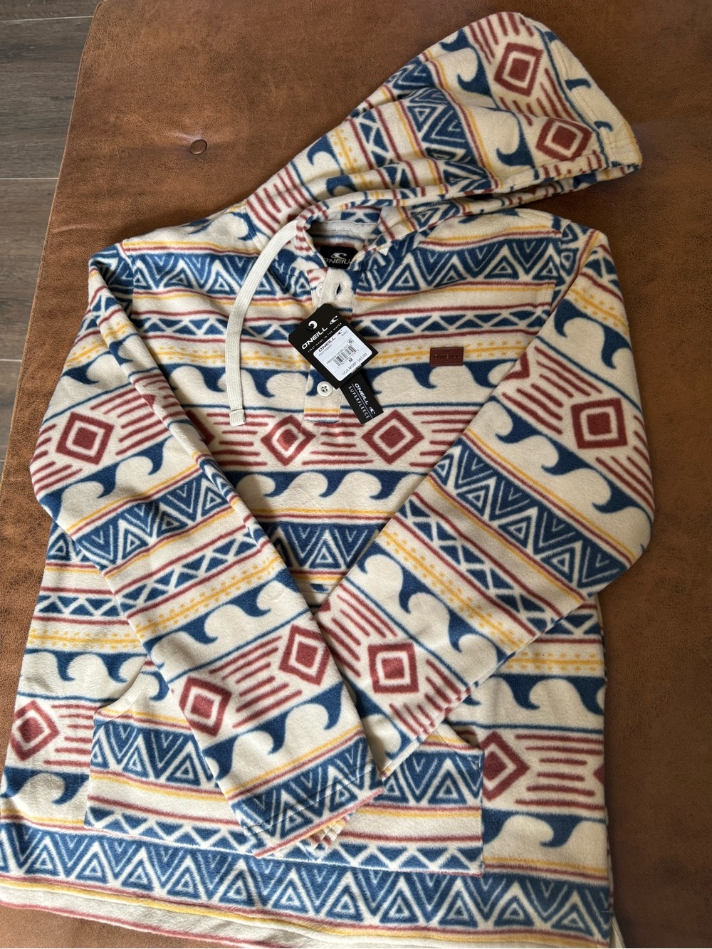 O'Neill Cream Hooded Pullover with Blue and Rust Geometric Print